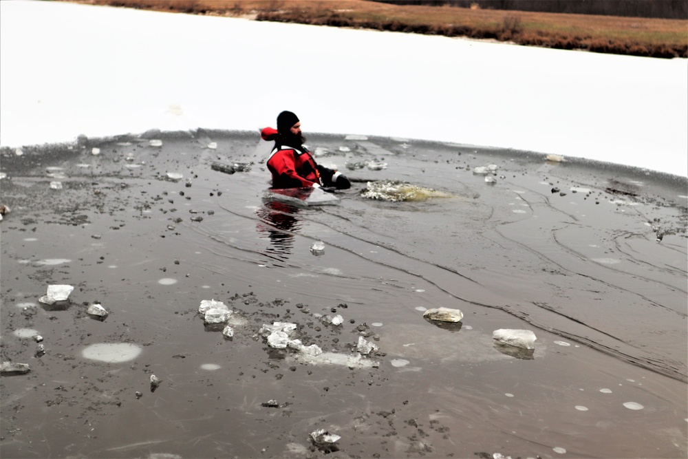 Marines jump in for cold-water immersion training during CWOC ops at Fort McCoy