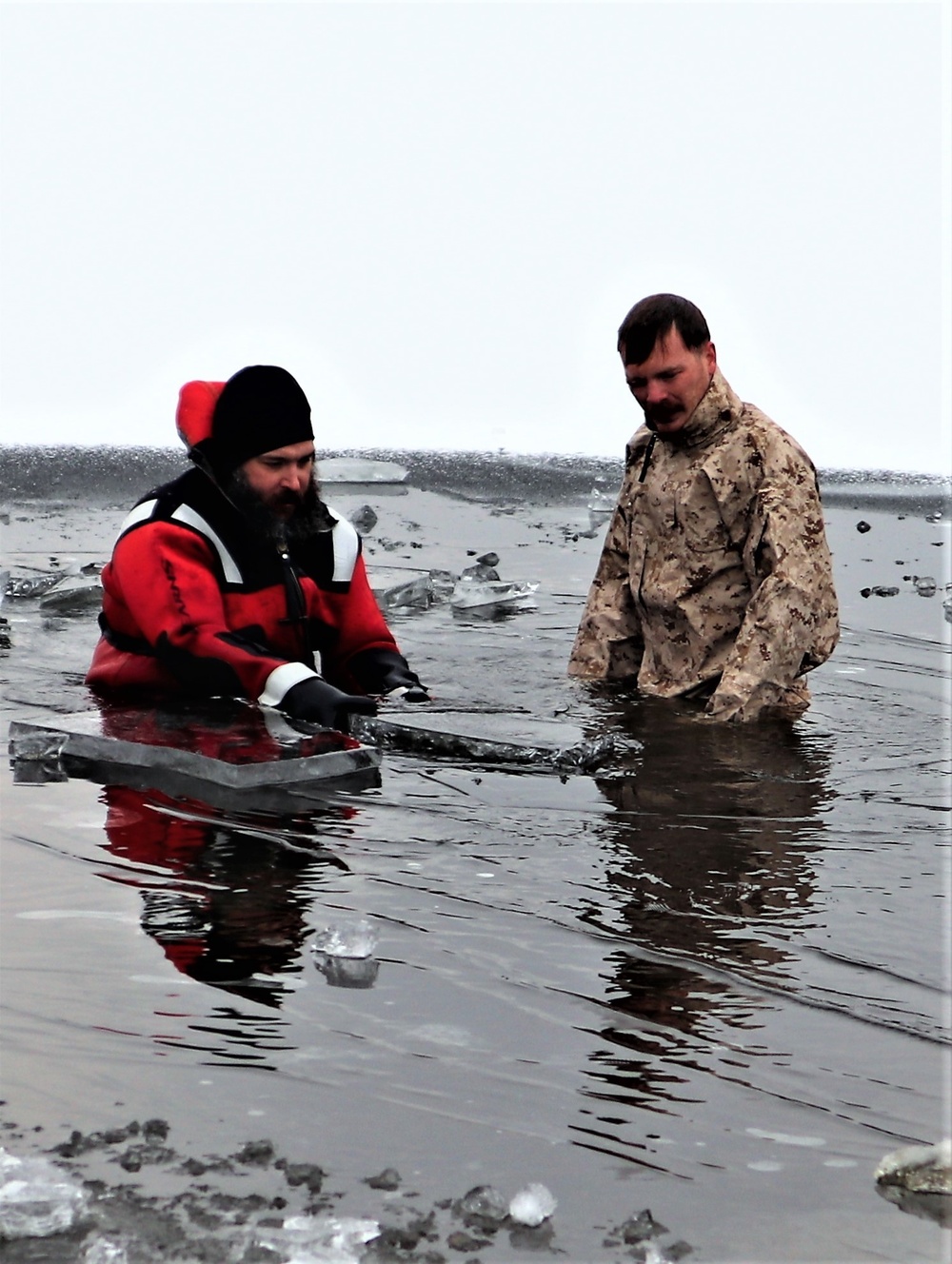 Marines jump in for cold-water immersion training during CWOC ops at Fort McCoy