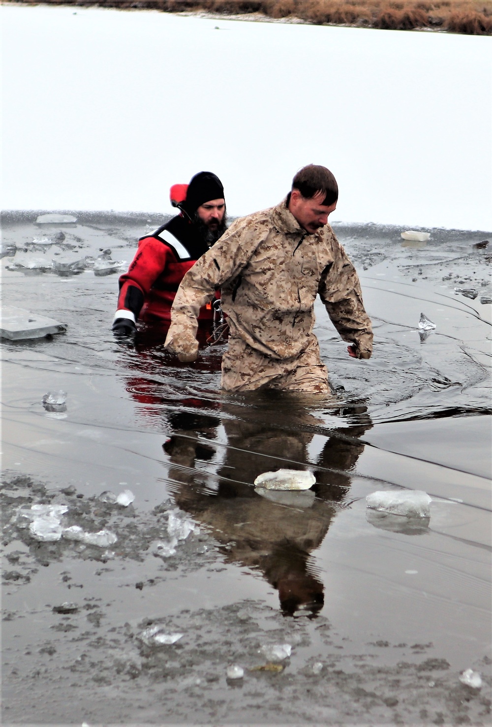 Marines jump in for cold-water immersion training during CWOC ops at Fort McCoy