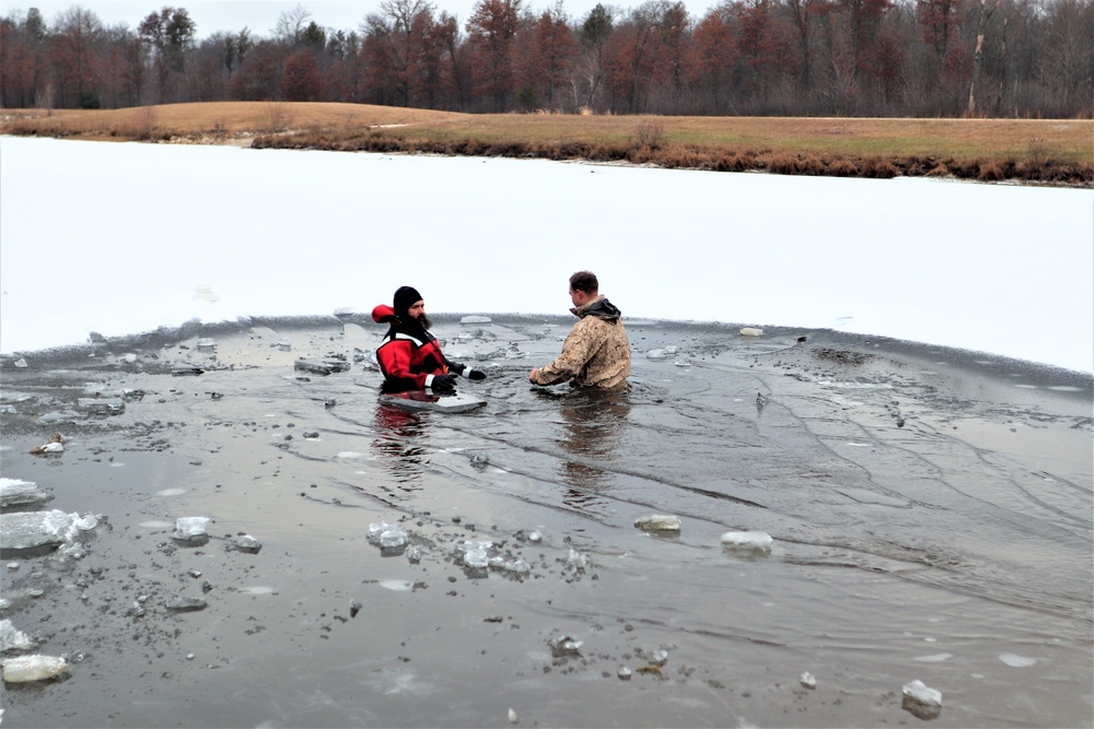 Marines jump in for cold-water immersion training during CWOC ops at Fort McCoy