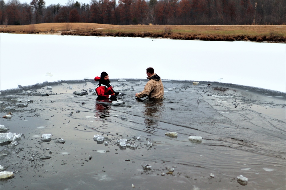 Marines jump in for cold-water immersion training during CWOC ops at Fort McCoy