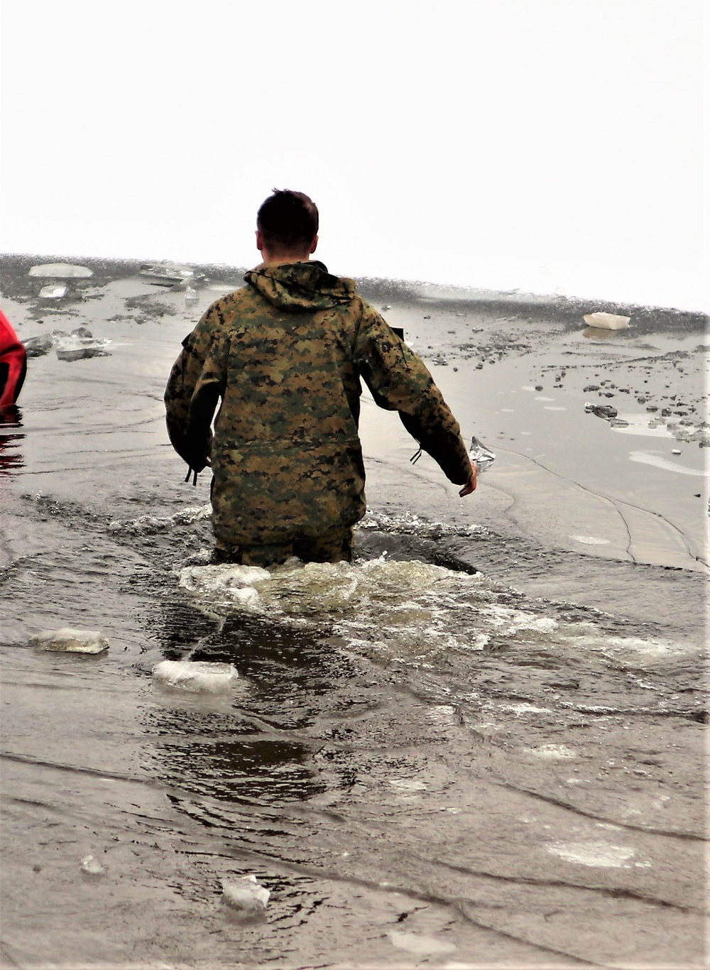 Marines jump in for cold-water immersion training during CWOC ops at Fort McCoy