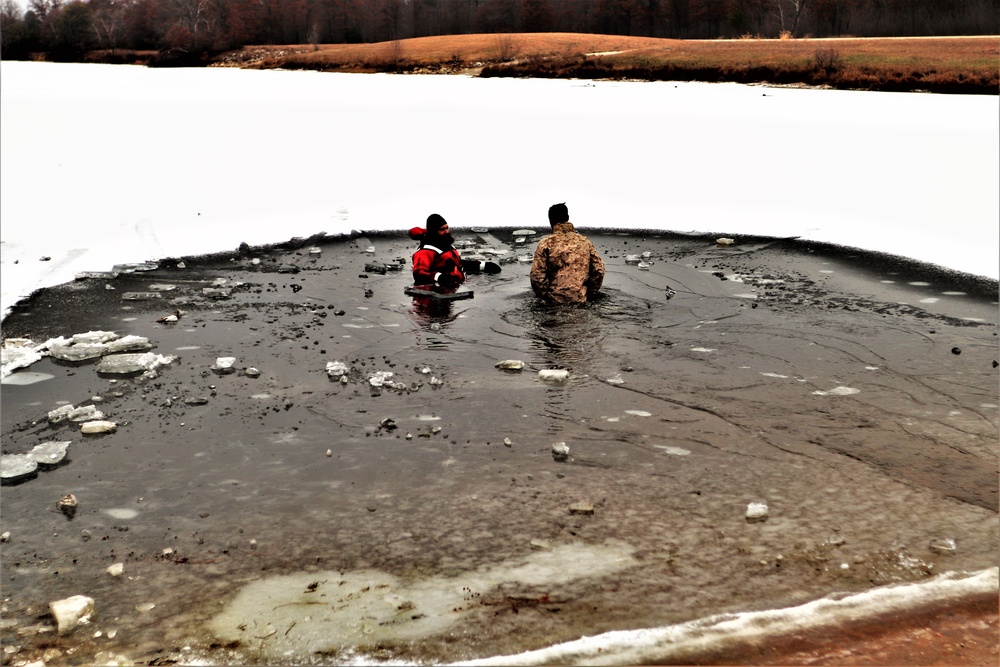 Marines jump in for cold-water immersion training during CWOC ops at Fort McCoy