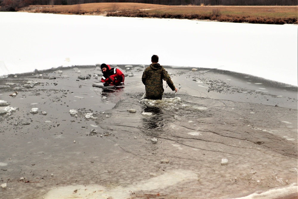 Marines jump in for cold-water immersion training during CWOC ops at Fort McCoy