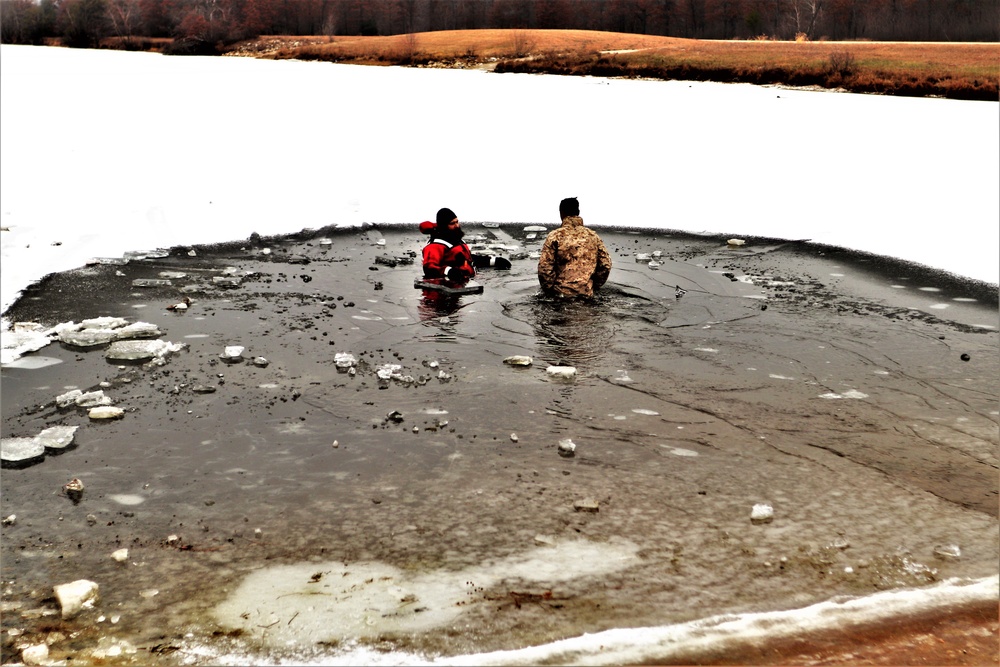 Marines jump in for cold-water immersion training during CWOC ops at Fort McCoy