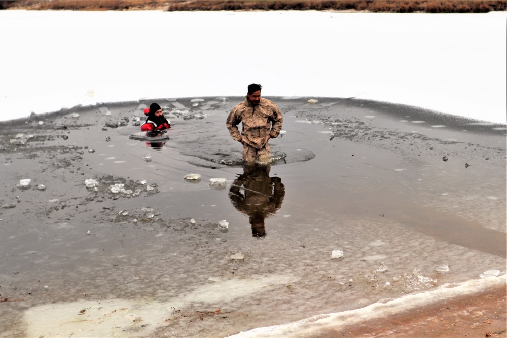 Marines jump in for cold-water immersion training during CWOC ops at Fort McCoy