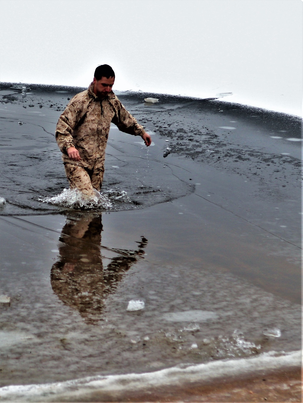 Marines jump in for cold-water immersion training during CWOC ops at Fort McCoy