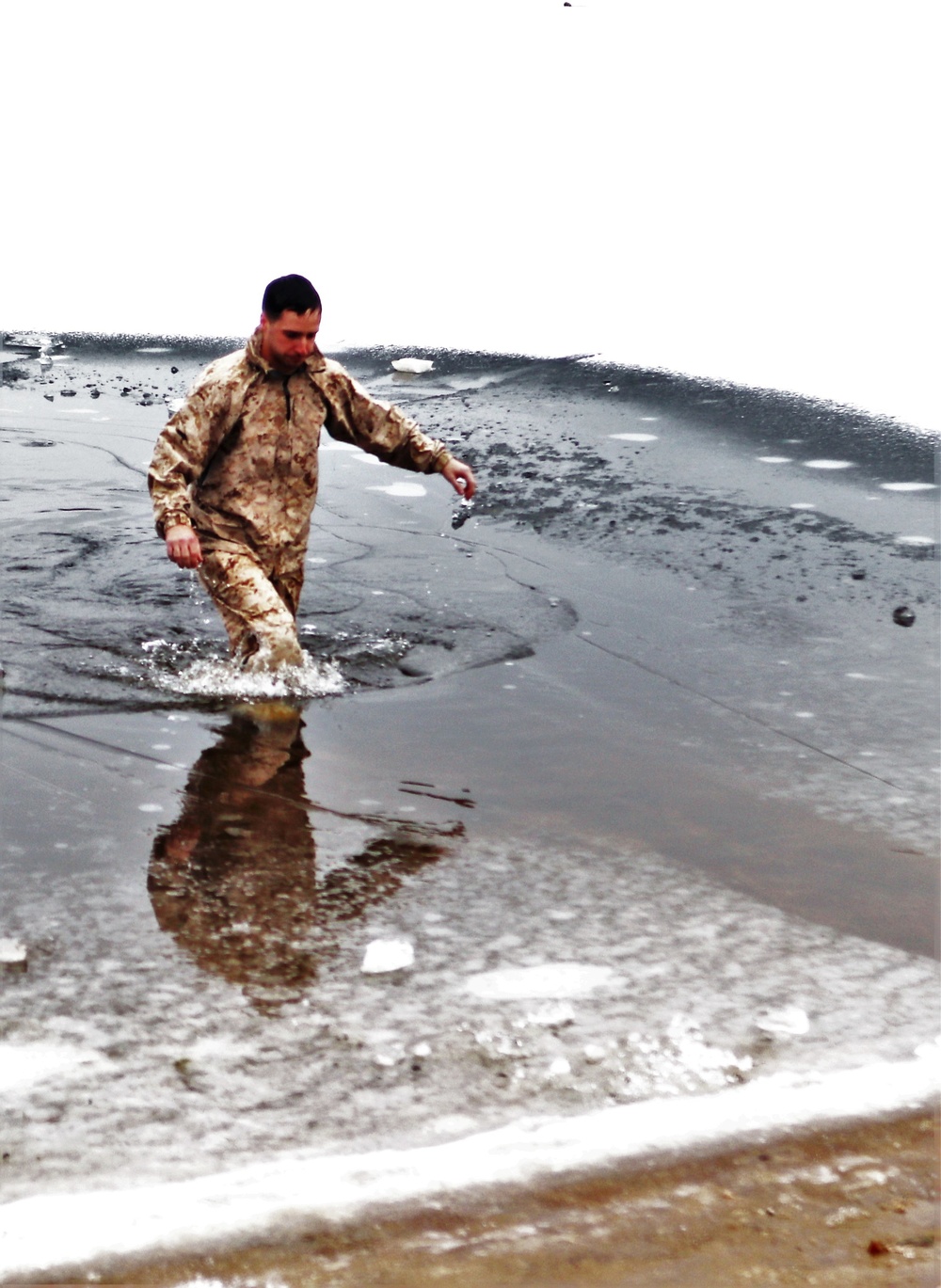 Marines jump in for cold-water immersion training during CWOC ops at Fort McCoy