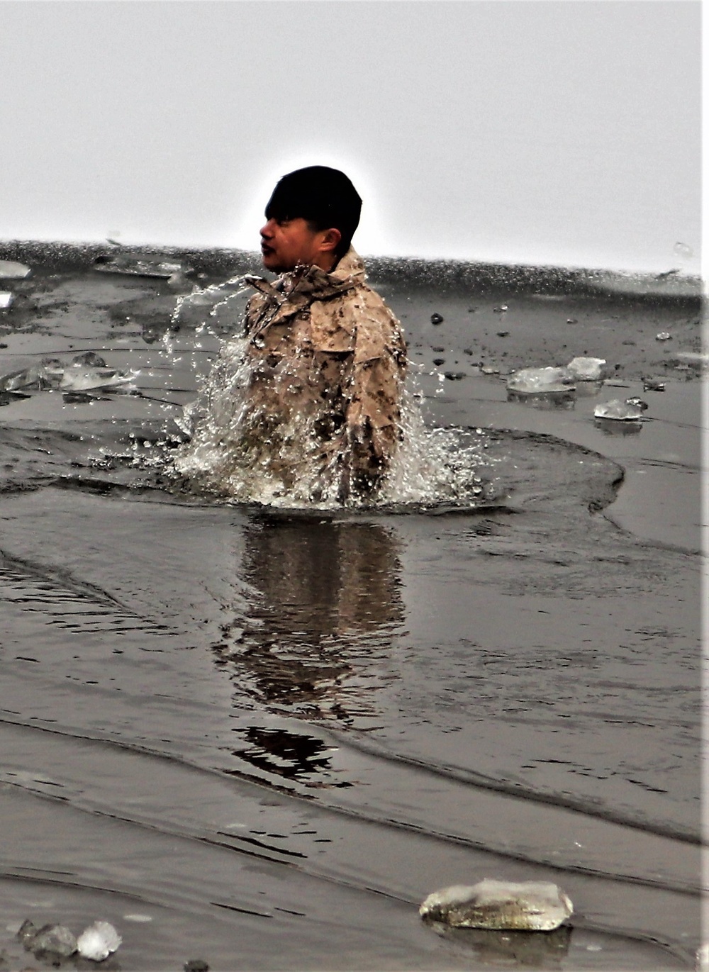 Marines jump in for cold-water immersion training during CWOC ops at Fort McCoy