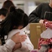 Girl Embraces Gift
