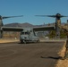 U.S. Marines fuel a U.S. Air Force CV-22 Osprey