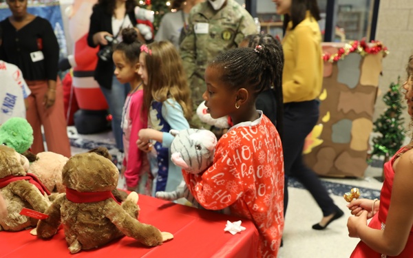 Texas State Guard donates toys to elementary school