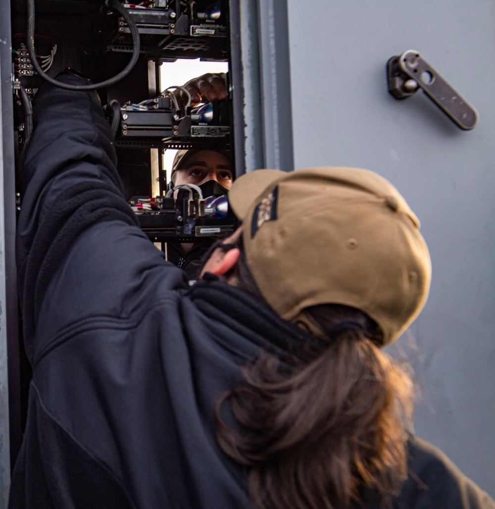 Sailors Maintain Flight Deck Lights