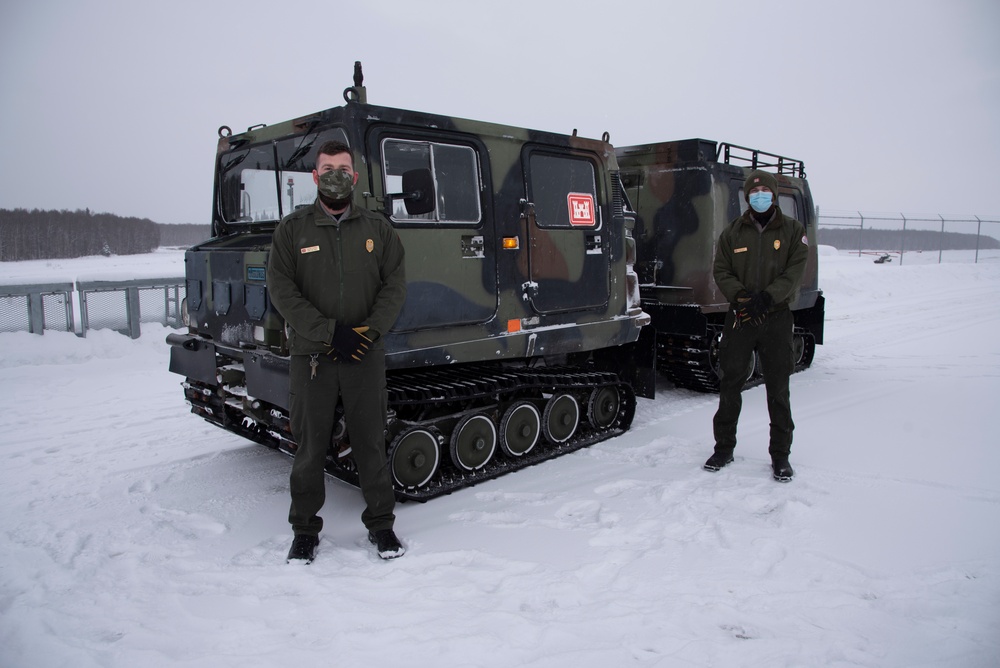 Army engineers utilize small unit support vehicle at flood control project in Alaska