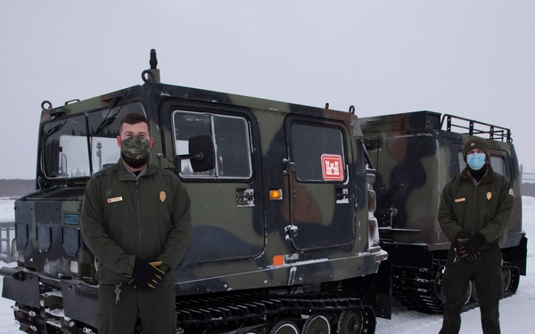 Army engineers utilize small unit support vehicle at flood control project in Alaska