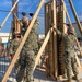 US Navy Seabees with NMCB-5 build formwork for the Ground/Air Task-Oriented Radar project onboard Camp Hansen