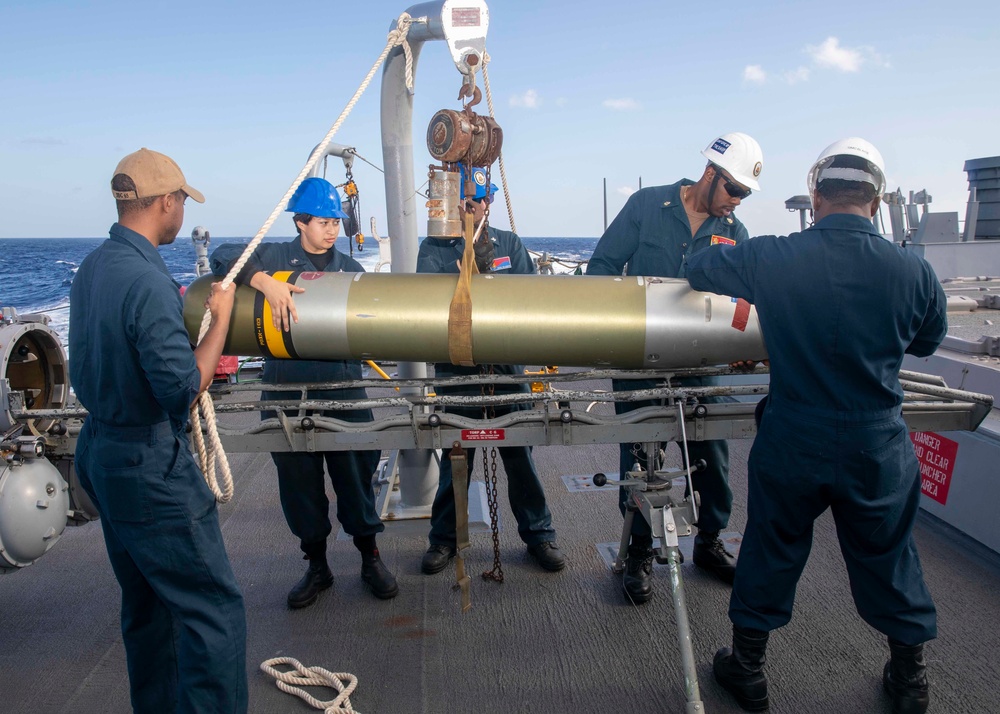 Sailors Load Torpedo