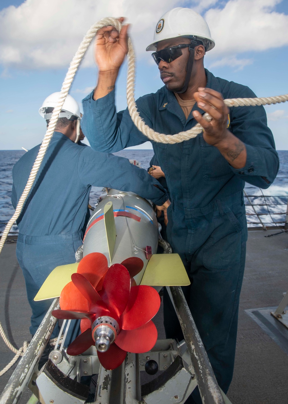 Sailors Load Torpedo