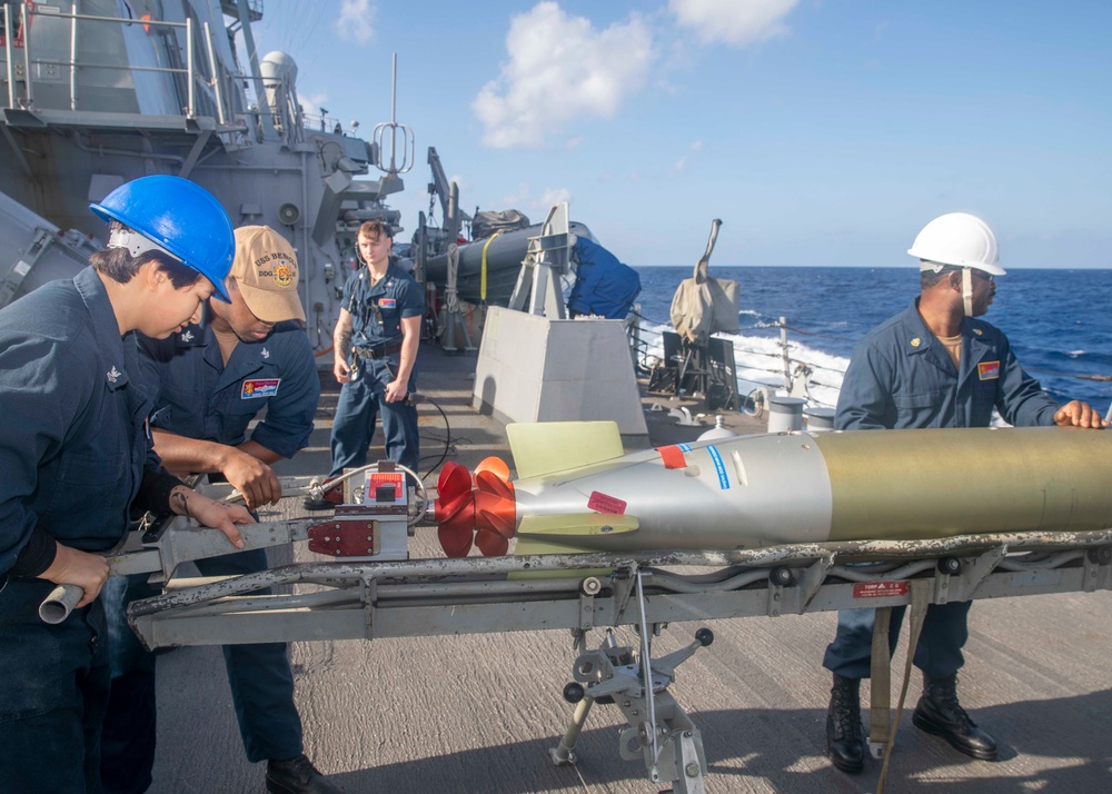 Sailors Load Torpedo