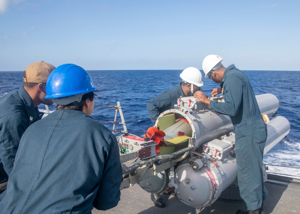 Sailors Load Torpedo