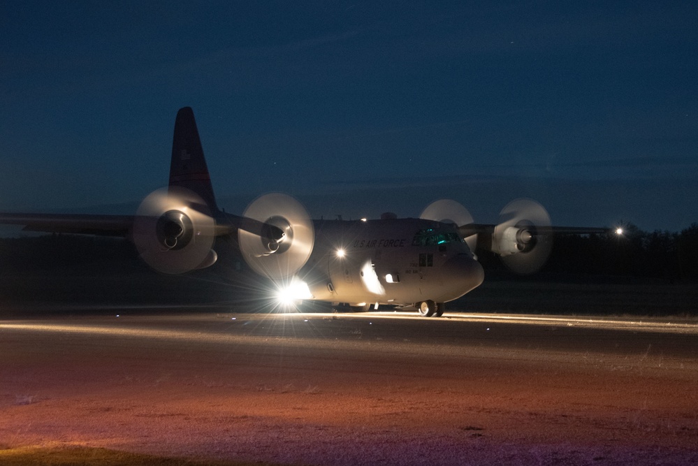 Illinois Air National Guard lands C-130 at night