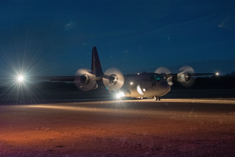 Illinois Air National Guard lands C-130 at night