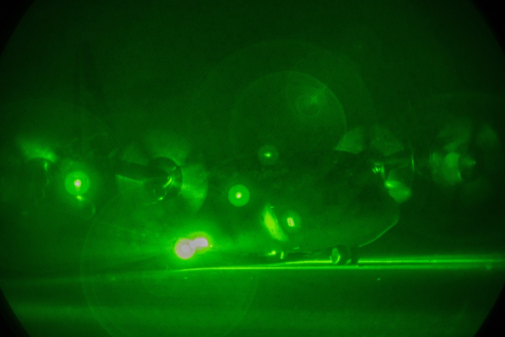 Illinois Air National Guard lands C-130 at night