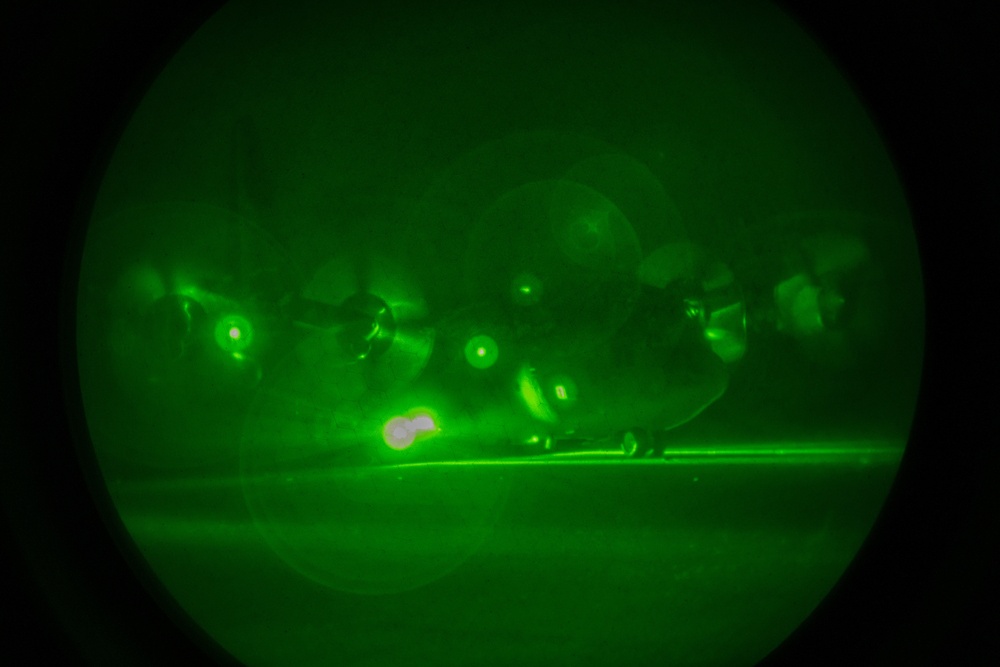 Illinois Air National Guard lands C-130 at night