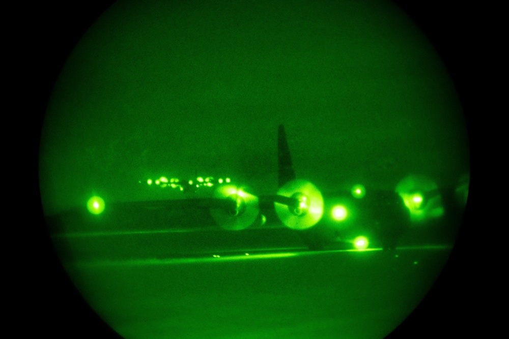 Illinois Air National Guard lands C-130 at night