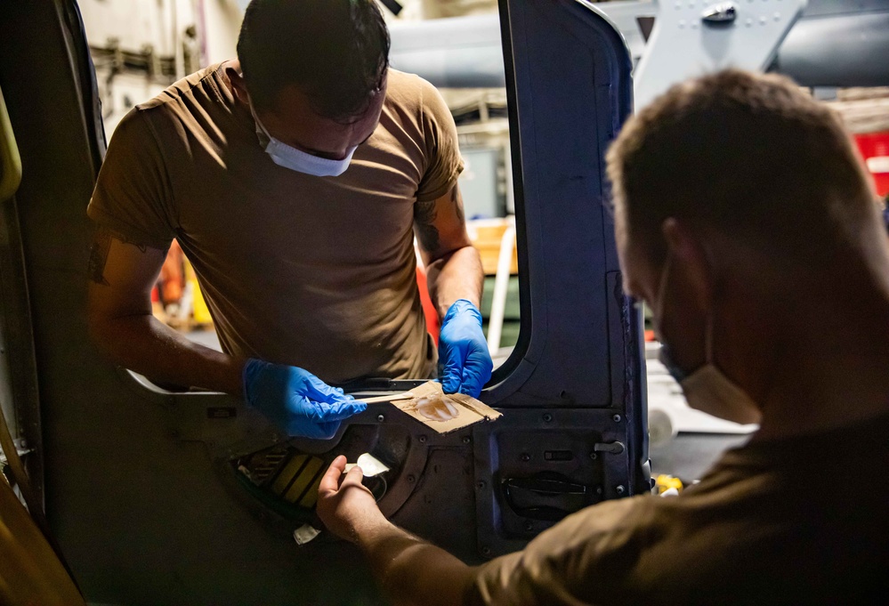 HSC 22 Sailors Conduct Maintenance on MH-60S Sea Hawk Helicopter