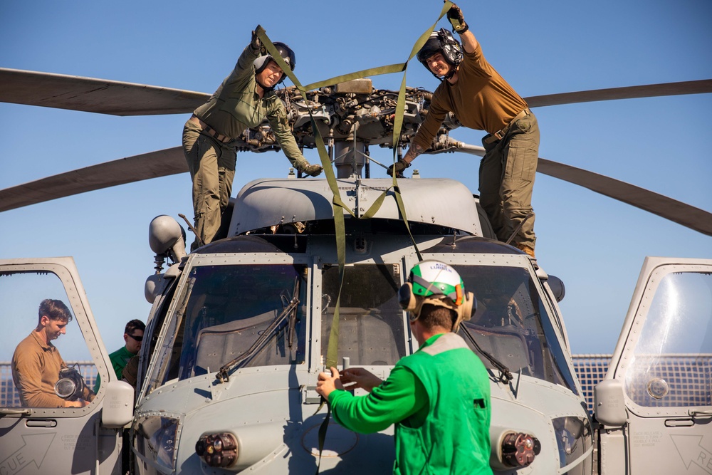 HSC 28 Sailors Conduct Pre-Flight Checks of MH-60S Sea Hawk Helicopter