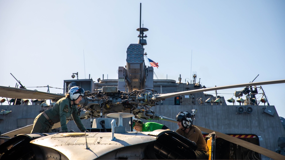 HSC 28 Sailors Conduct Pre-Flight Checks of MH-60S Sea Hawk Helicopter