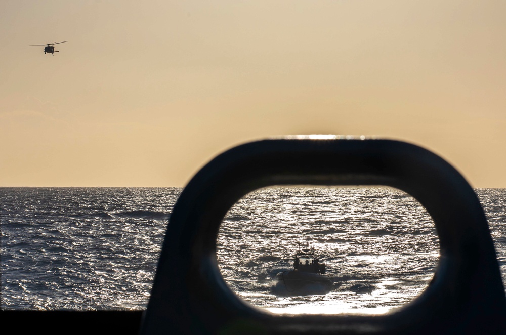 Coast Guardsmen and Sailors Assigned to USS Billings Conduct RHIB Ops with Air Detachment