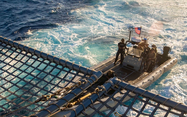 Coast Guardsmen and Sailors Assigned to USS Billings Recover RHIB
