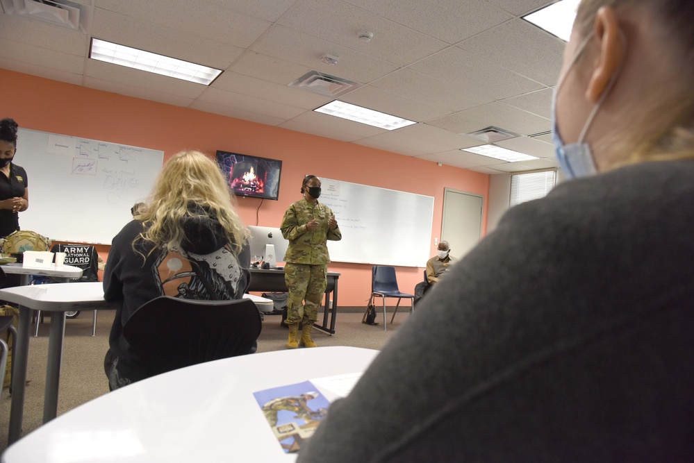 Michigan National Guard members discuss career goals with local high school students during Military Career Day