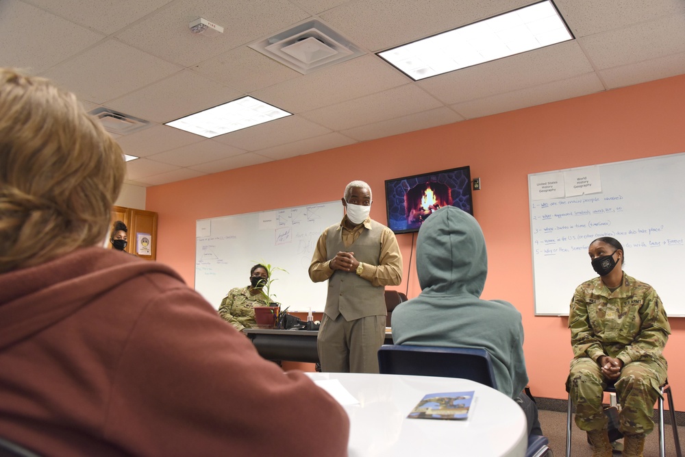 Michigan National Guard members discuss career goals with local high school students during Military Career Day