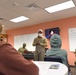 Michigan National Guard members discuss career goals with local high school students during Military Career Day