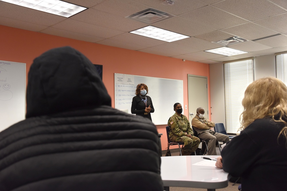 Michigan National Guard members discuss career goals with local high school students during Military Career Day