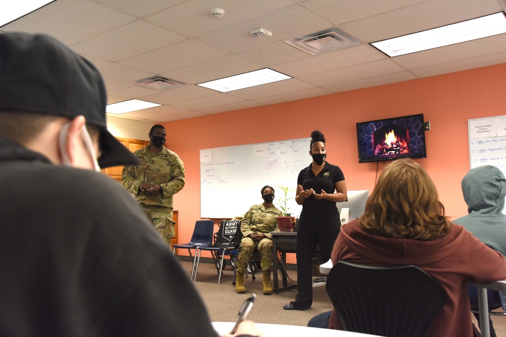 Michigan National Guard members discuss career goals with local high school students during Military Career Day