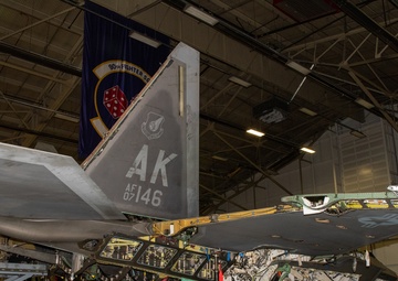 Crew chiefs rebuild F-22 after fiery crash