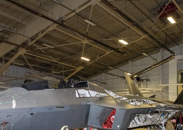 Crew chiefs rebuild F-22 after fiery crash