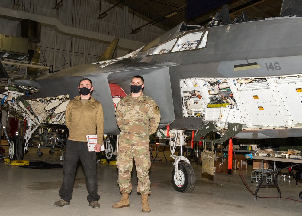 Crew chiefs rebuild F-22 after fiery crash