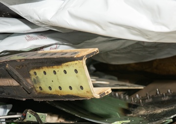 Crew chiefs rebuild F-22 after fiery crash