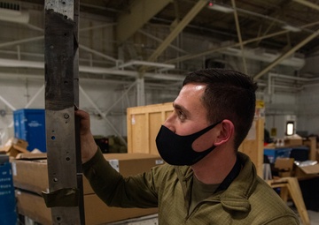 Crew chiefs rebuild F-22 after fiery crash