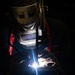 USS Carl Vinson (CVN 70) Sailors Weld in Vinson's Machine Shop
