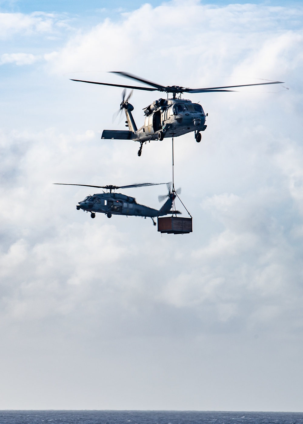 USS Carl Vinson (CVN 70) Conducts A Vertical Replenishment-at-Sea with USNS Carl Brashear (T-AKE 7)