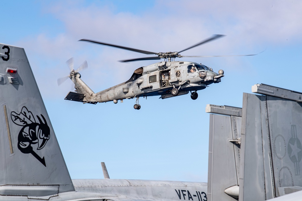 USS Carl Vinson (CVN 70) Conducts A Vertical Replenishment-at-Sea with USNS Carl Brashear (T-AKE 7)