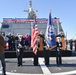 Guests render honors at the commissioning celebration for USS Kansas City (LCS 22)