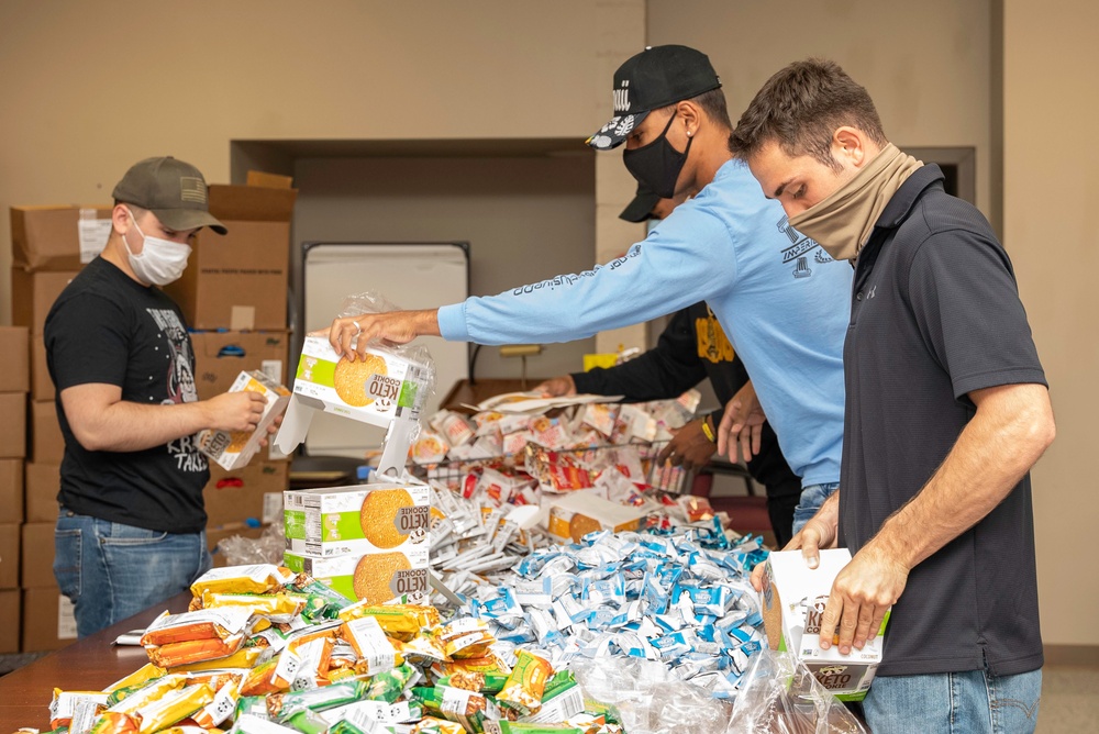 Holiday Food Basket Packing at the Hickam Commissary