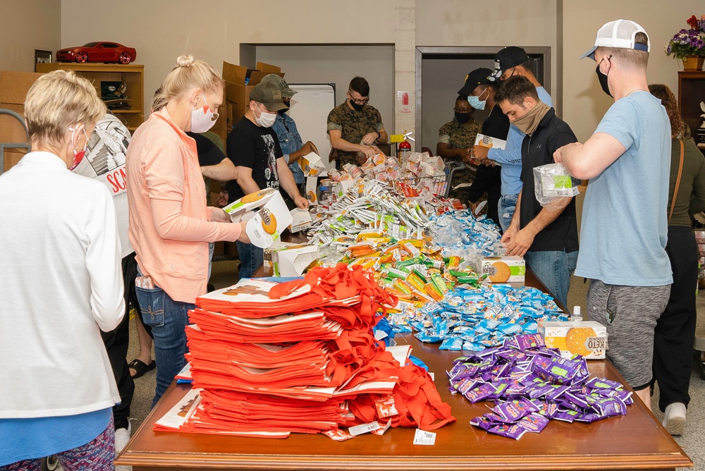 Holiday Food Basket Packing at the Hickam Commissary